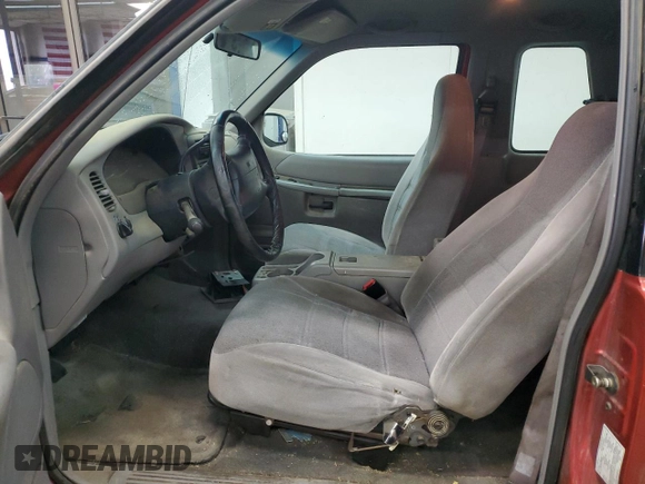 1999 Ford Explorer Sport z VIN 1FMYU24X3XUB23512, wystawiony jako Copart lot #82668734 z przebiegiem 228 701 mil mil oraz Szkoda całkowita • Salvage title. Historia ofert i sprzedaży dostępna na DreamBid. Obrazek 7.