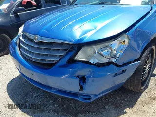 2008 Chrysler Sebring LX z VIN 1C3LC45KX8N180208, wystawiony jako IAAI lot #42191780 z przebiegiem 263 970 mil mil oraz . Historia ofert i sprzedaży dostępna na DreamBid. Obrazek 6.