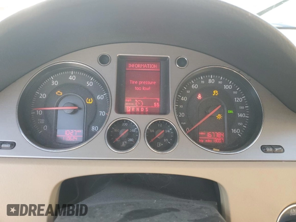 2009 Volkswagen Passat z VIN WVWXK73C99E046868, wystawiony jako Copart lot #79549784 z przebiegiem 167 784 mil mil oraz Szkoda całkowita • Salvage title. Historia ofert i sprzedaży dostępna na DreamBid. Obrazek 9.