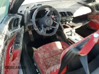 2018 Audi R8 Spyder performance z VIN WUA4BCFX2J7901190, wystawiony jako Copart lot #75090384 z przebiegiem Nie podano mil oraz Nie do naprawy. Historia ofert i sprzedaży dostępna na DreamBid. Obrazek 8.
