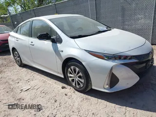 2022 Toyota Prius LE z VIN JTDKAMFP3N3202936, wystawiony jako IAAI lot #42238577 z przebiegiem 38 065 mil mil oraz . Historia ofert i sprzedaży dostępna na DreamBid. Obrazek 1.