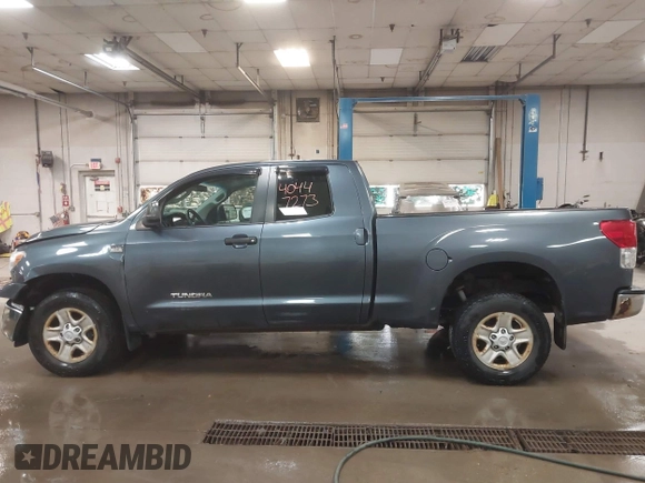 2010 Toyota Tundra 4WD Truck with VIN 5TFUM5F16AX006879, listed as a IAAI auction lot 40447273 with 219,498 mi miles. Bid and sale history available at carsss.com. Image 14.