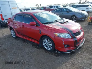 2009 Toyota Corolla with VIN 1NXBU40EX9Z027482, listed as a IAAI auction lot 42149978 with 164,318 mi miles. Bid and sale history available at carsss.com. Image 1.