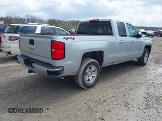 2018 Chevrolet Silverado 1500 LT with VIN 1GCVKREH9JZ119861, listed as a IAAI auction lot 42016088 with 91,176 mi miles and . Bid and sale history available at DreamBid. Image 4.