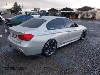 2013 BMW 3 Series 335i with VIN WBA3A9C50DF475024, listed as a IAAI auction lot 40884045 with 120,121 mi miles. Bid and sale history available at carsss.com. Image 4.