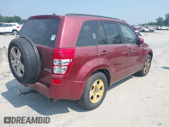 2006 Suzuki Grand Vitara Luxury z VIN JS3TE947164104865, wystawiony jako IAAI lot #42364904 z przebiegiem 189 000 mil mil oraz . Historia ofert i sprzedaży dostępna na DreamBid. Obrazek 4.