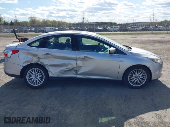 2012 Ford Focus SEL with VIN 1FAHP3H29CL151658, listed as a IAAI auction lot 42060139 with 149,547 mi miles and . Bid and sale history available at carsss.com. Image 13.