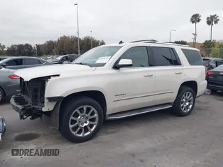 2015 GMC Yukon Denali with VIN 1GKS2CKJ9FR294551, listed as a IAAI auction lot 42162654 with 106,063 mi miles. Bid and sale history available at carsss.com. Image 15.