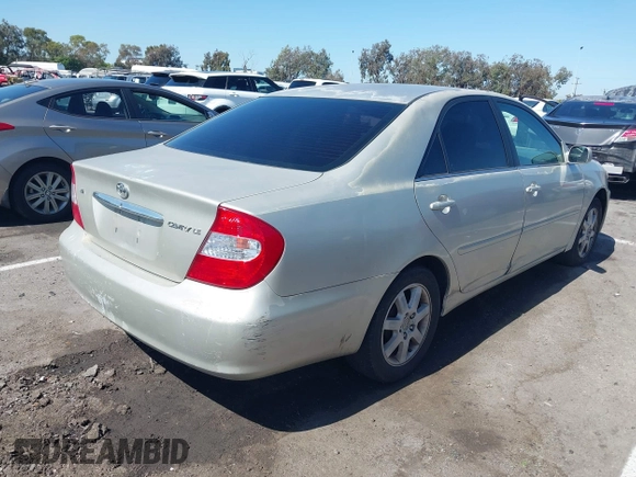 2004 Toyota Camry LE with VIN 4T1BE32K84U341747, listed as a IAAI auction lot 42701813 with 245,431 mi miles and . Bid and sale history available at DreamBid. Image 4.