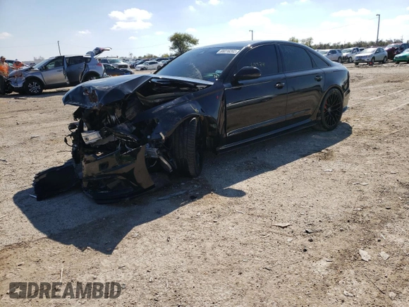 2015 Audi A6 3.0T Prestige with VIN WAUHGAFC7FN009521, listed as a Copart auction lot 66016282 with 69,974 mi miles. Bid and sale history available at carsss.com. Image 2.