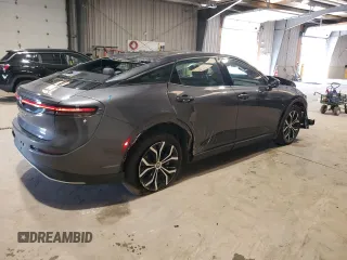 2023 Toyota Crown XLE z VIN JTDAAAAF5P3014060, wystawiony jako Copart lot #54799945 z przebiegiem 32 495 mil mil oraz Szkoda całkowita • Salvage title. Historia ofert i sprzedaży dostępna na DreamBid. Obrazek 3.