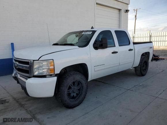 2011 Chevrolet Silverado 1500 LS with VIN 3GCPKREAXBG404727, listed as a Copart auction lot 86861374 with 153,928 mi miles and Salvage Title. Bid and sale history available at carsss.com. Image 1.