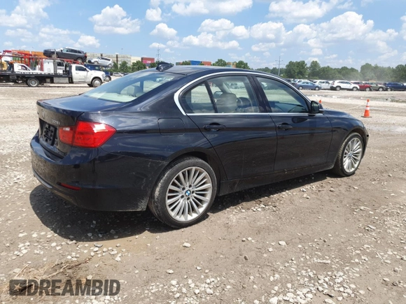 2015 BMW 3 Series 328i xDrive with VIN WBA3B3C5XFJ984550, listed as a Copart auction lot 63096835 with 127,931 mi miles and Clean title. Bid and sale history available at DreamBid. Image 3.