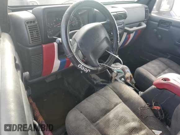 2003 Jeep Wrangler X with VIN 1J4FA39S33P364688, listed as a Copart auction lot 74842374 with Not Provided miles and Non Repairable. Bid and sale history available at carsss.com. Image 8.