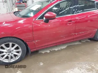 2016 Mazda 6 i Sport with VIN JM1GJ1U51G1410415, listed as a IAAI auction lot 42005514 with 152,241 mi miles and . Bid and sale history available at DreamBid. Image 6.