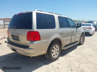 2004 Lincoln Navigator Luxury with VIN 5LMFU27R74LJ33852, listed as a IAAI auction lot 41985575 with 1 mi miles. Bid and sale history available at carsss.com. Image 4.