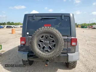 2017 Jeep Wrangler Unlimited Sport with VIN 1C4HJWDG6HL627015, listed as a Copart auction lot 63864755 with 113,443 mi miles and Salvage title. Bid and sale history available at DreamBid. Image 6.
