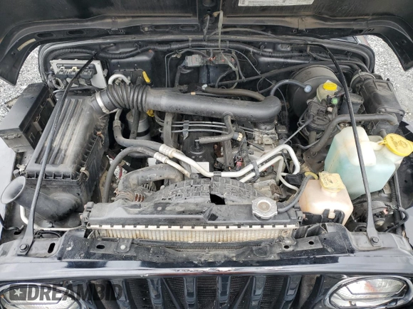 2002 Jeep Wrangler Sport with VIN 1J4FA49S12P730135, listed as a Copart auction lot 54477835 with 148,153 mi miles and Salvage title. Bid and sale history available at DreamBid. Image 11.