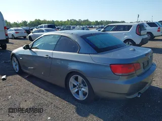 2007 BMW 3 Series 335i with VIN WBAWL73587PX49709, listed as a IAAI auction lot 41989465 with 147,255 mi miles. Bid and sale history available at carsss.com. Image 3.