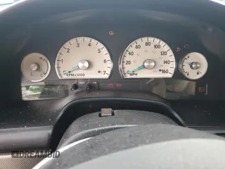 2005 Ford Thunderbird Deluxe z VIN 1FAHP60A55Y102032, wystawiony jako Copart lot #73761144 z przebiegiem 50 402 mil mil oraz Szkoda całkowita • Salvage title. Historia ofert i sprzedaży dostępna na DreamBid. Obrazek 9.
