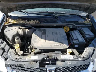 2014 Dodge Grand Caravan American Value with VIN 2C4RDGBG2ER361449, listed as a Copart auction lot 54940615 with 85,012 mi miles and Salvage Title. Bid and sale history available at DreamBid. Image 12.