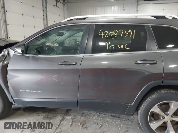 2019 Jeep Cherokee Limited with VIN 1C4PJMDX2KD467412, listed as a IAAI auction lot 42087391 with 106,168 mi miles and . Bid and sale history available at DreamBid. Image 14.