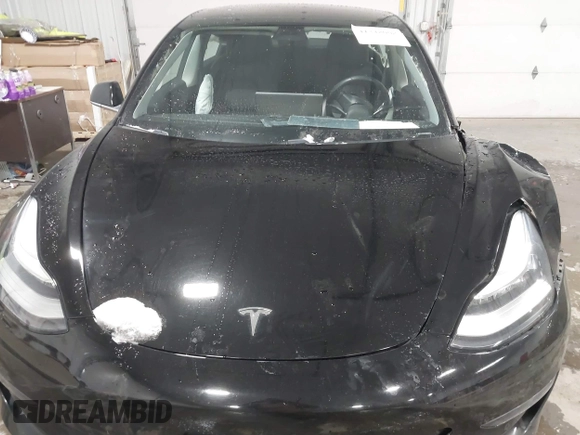 2018 Tesla Model 3 Long Range Battery with VIN 5YJ3E1EB7JF086778, listed as a IAAI auction lot 41348008 with 74,491 mi miles and . Bid and sale history available at DreamBid. Image 10.