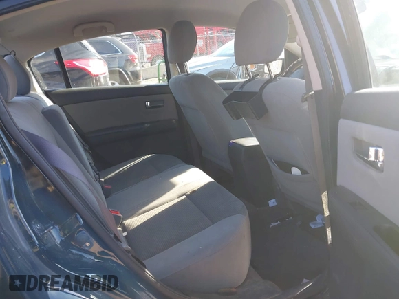 2012 Nissan Sentra S with VIN 3N1AB6AP4CL695980, listed as a IAAI auction lot 41733972 with 117,759 mi miles and . Bid and sale history available at DreamBid. Image 8.