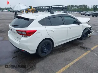 2023 Subaru Impreza with VIN 4S3GTAB6XP3706463, listed as a IAAI auction lot 42201164 with 71,572 mi miles and . Bid and sale history available at DreamBid. Image 4.