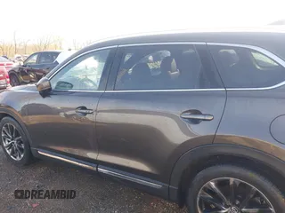 2016 Mazda CX-9 Grand Touring z VIN JM3TCBDY3G0104001, wystawiony jako IAAI lot #41961054 z przebiegiem 77 057 mil mil oraz . Historia ofert i sprzedaży dostępna na DreamBid. Obrazek 14.