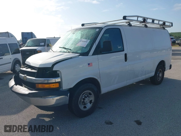 2019 Chevrolet Express Cargo Van with VIN 1GCWGAFG5K1254736, listed as a IAAI auction lot 41880050 with 136,132 mi miles. Bid and sale history available at carsss.com. Image 2.
