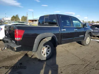 2004 Nissan Titan LE z VIN 1N6AA07B54N521567, wystawiony jako Copart lot #84048554 z przebiegiem 194 997 mil mil oraz Nie do naprawy • Non repairable. Historia ofert i sprzedaży dostępna na DreamBid. Obrazek 3.