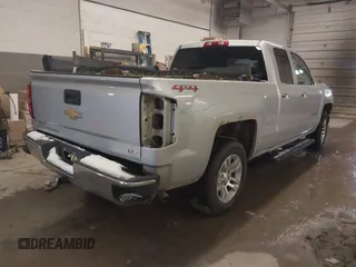 2014 Chevrolet Silverado 1500 LT with VIN 1GCVKREC1EZ343636, listed as a IAAI auction lot 41477466 with 142,194 mi miles. Bid and sale history available at carsss.com. Image 4.