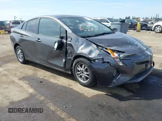 2016 Toyota Prius Four z VIN JTDKARFU9G3525152, wystawiony jako IAAI lot #42052301 z przebiegiem 153 706 mil mil oraz . Historia ofert i sprzedaży dostępna na DreamBid. Obrazek 1.