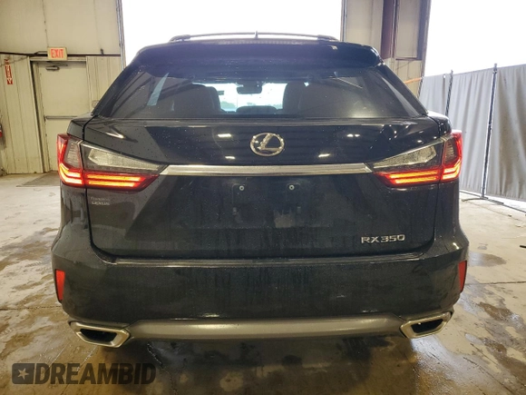 2016 Lexus RX 350 with VIN 2T2BZMCA3GC001679, listed as a Copart auction lot 57070835 with 74,729 mi miles and Salvage Title. Bid and sale history available at DreamBid. Image 6.