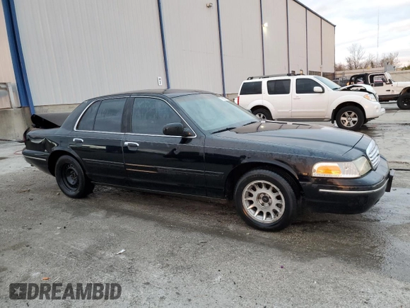 2000 Ford Crown Victoria LX z VIN 2FAFP74W3YX122481, wystawiony jako Copart lot #79189794 z przebiegiem 277 772 mil mil oraz Nie do naprawy • Non repairable. Historia ofert i sprzedaży dostępna na DreamBid. Obrazek 4.