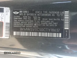 2012 MINI Hardtop S with VIN WMWSV3C50CTY18637, listed as a Copart auction lot 57771015 with 103,402 mi miles and Salvage title. Bid and sale history available at DreamBid. Image 12.