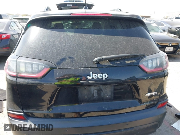 2019 Jeep Cherokee Latitude Plus with VIN 1C4PJLLB0KD358852, listed as a IAAI auction lot 41794999 with 112,667 mi miles. Bid and sale history available at carsss.com. Image 17.