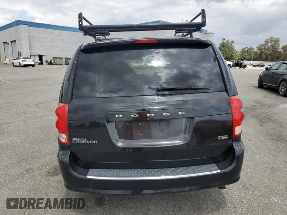 2013 Dodge Grand Caravan SXT with VIN 2C4RDGCGXDR581399, listed as a Copart auction lot 54787935 with 162,970 mi miles and Salvage Title. Bid and sale history available at DreamBid. Image 6.