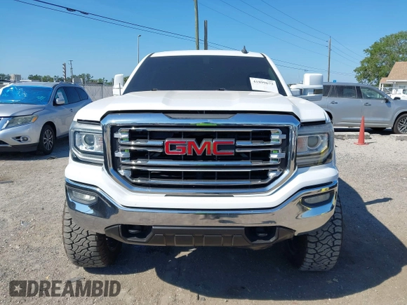 2017 GMC Sierra 1500 SLT z VIN 3GTU2NEC2HG474079, wystawiony jako IAAI lot #41899673 z przebiegiem 104 033 mil mil oraz . Historia ofert i sprzedaży dostępna na DreamBid. Obrazek 12.
