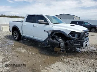 2017 Ram 1500 Rebel z VIN 1C6RR6YT2HS693644, wystawiony jako Copart lot #52570215 z przebiegiem 127 023 mil mil oraz Nie do naprawy • Non repairable. Historia ofert i sprzedaży dostępna na DreamBid. Obrazek 4.