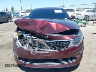 2018 Kia Optima LX with VIN 5XXGT4L3XJG248906, listed as a IAAI auction lot 42247354 with 112,905 mi miles and . Bid and sale history available at DreamBid. Image 12.