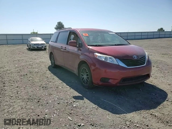 2014 Toyota Sienna LE with VIN 5TDJK3DC5ES093932, listed as a Copart auction lot 63611985 with 142,044 mi miles and Salvage title. Bid and sale history available at DreamBid. Image 14.