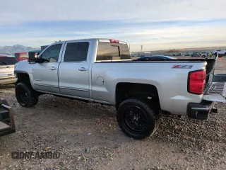2015 Chevrolet Silverado 3500HD LTZ with VIN 1GC4K0E82FF634054, listed as a Copart auction lot 85249714 with 121,703 mi miles and Salvage Title. Bid and sale history available at carsss.com. Image 2.