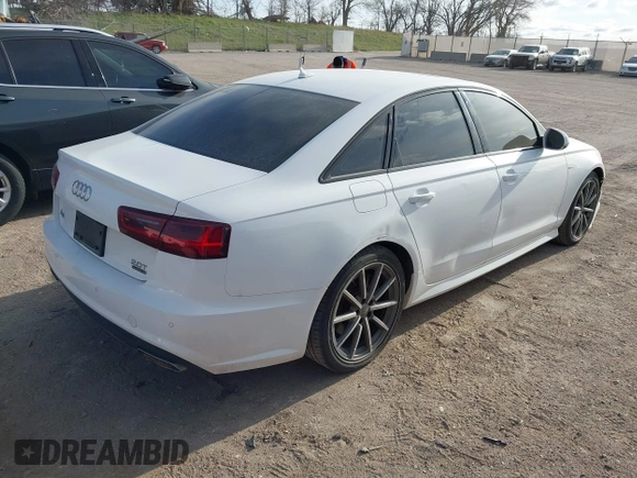 2017 Audi A6 Premium z VIN WAUF8AFC1HN100842, wystawiony jako IAAI lot #42024333 z przebiegiem 89 275 mil mil oraz . Historia ofert i sprzedaży dostępna na DreamBid. Obrazek 4.