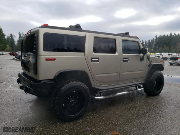 2003 Hummer H2 with VIN 5GRGN23U73H111109, listed as a Copart auction lot 76388144 with 160,179 mi miles and Salvage Title. Bid and sale history available at carsss.com. Image 3.