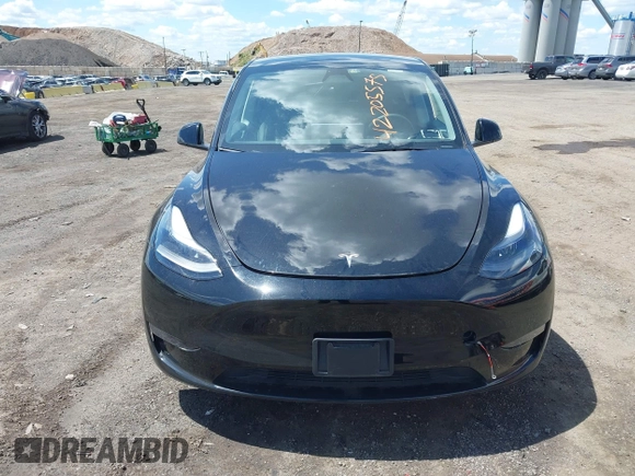 2023 Tesla Model Y Long Range with VIN 7SAYGDEE0PA183891, listed as a IAAI auction lot 42205573 with 41,273 mi miles and . Bid and sale history available at DreamBid. Image 12.