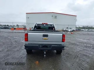 2014 Chevrolet Silverado 1500 Work Truck with VIN 1GCVKPEH0EZ315892, listed as a IAAI auction lot 41763185 with 180,868 mi miles and . Bid and sale history available at DreamBid. Image 17.