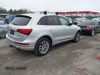 2013 Audi Q5 Premium with VIN WA1CFAFP7DA070577, listed as a IAAI auction lot 42021724 with 142,449 mi miles. Bid and sale history available at carsss.com. Image 4.