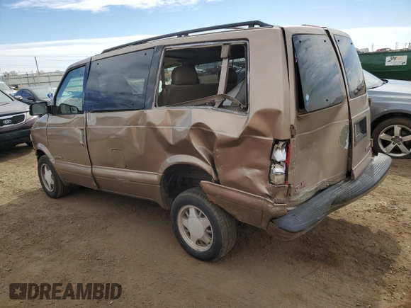 1999 GMC Safari z VIN 1GKDM19WXXB512466, wystawiony jako Copart lot #48068505 z przebiegiem 179 526 mil mil oraz Szkody całkowita. Historia ofert i sprzedaży dostępna na DreamBid. Obrazek 2.